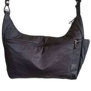 Pacsafe Citysafe CS200 Anti-Theft Handbag - Women's Black with Peach Lining